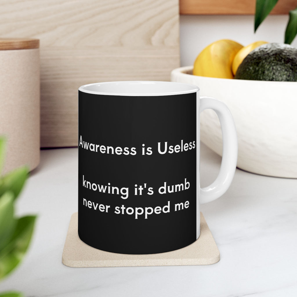 Awareness is Useless Mug